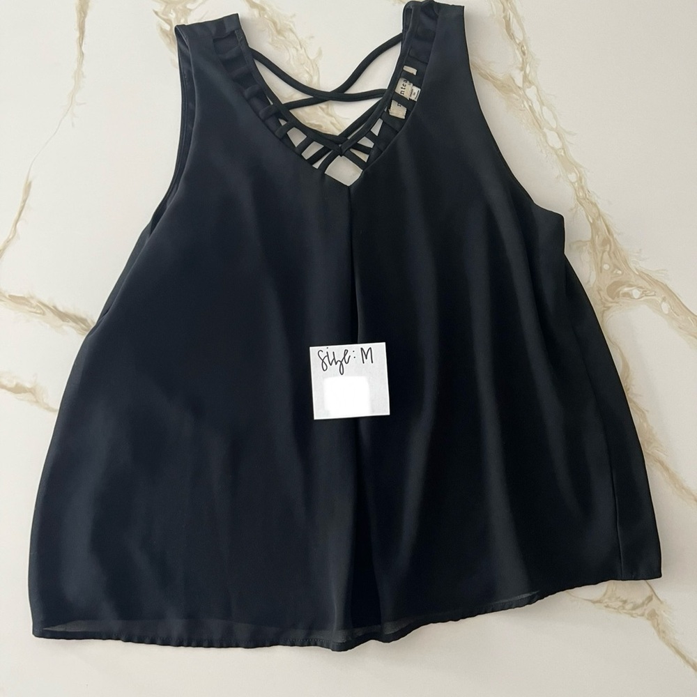 Size M black tank for sale. Good condition.